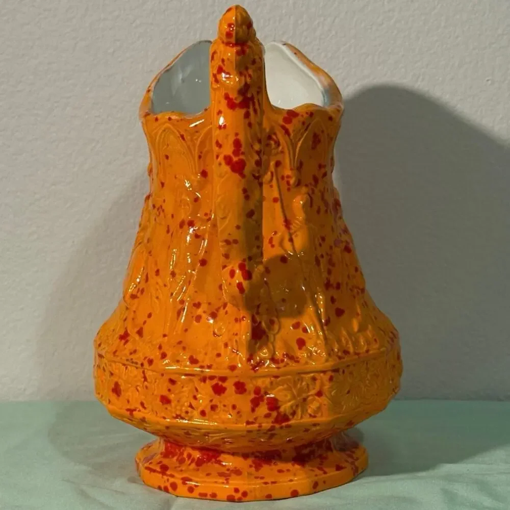 Vintage Medieval design ceramic mold pitcher. Knights jousting. 1979.